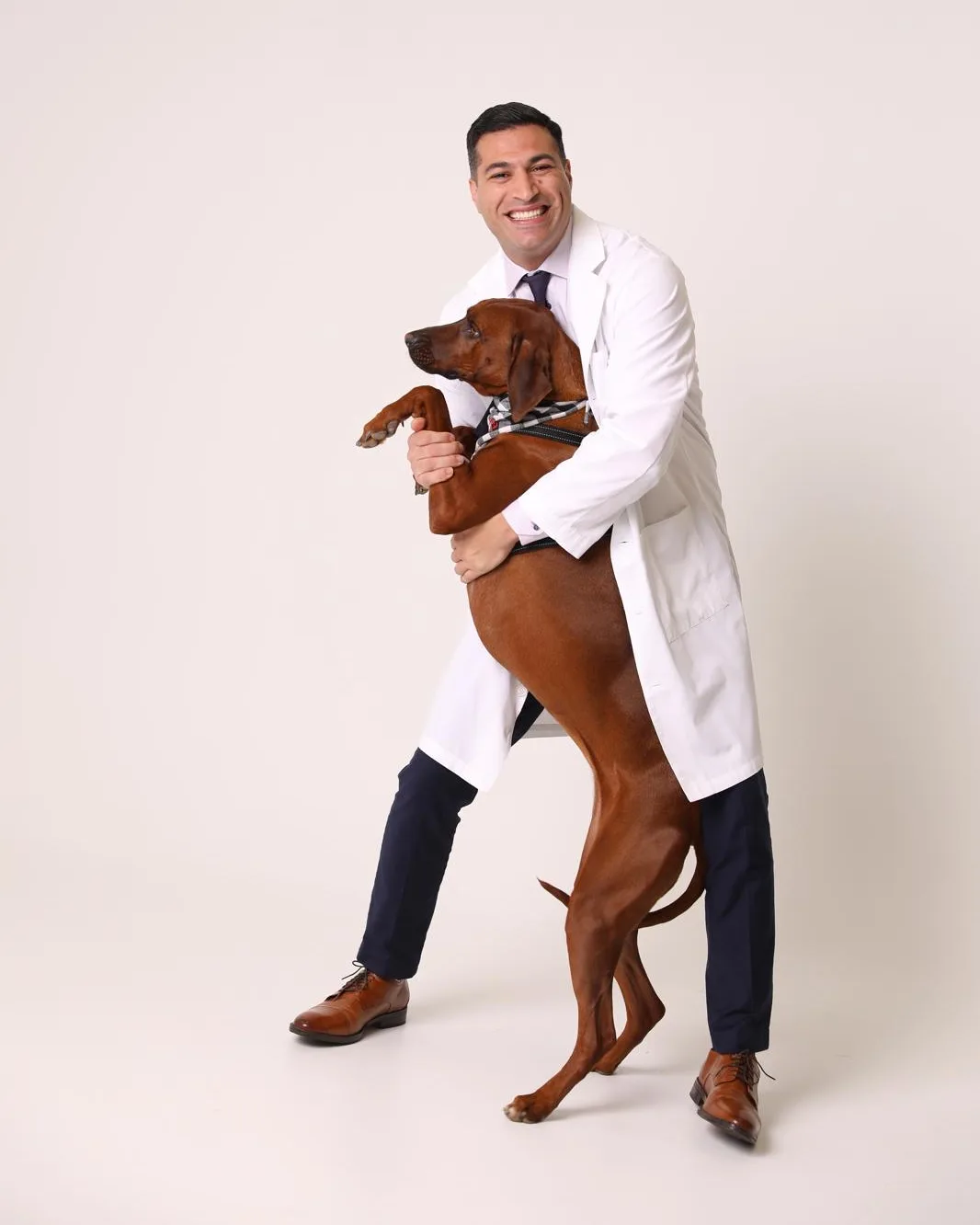 Ahmed K. Shujairi, DDS, with his dog